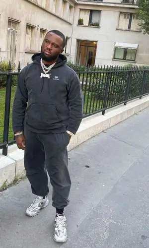 Headie One wearing Balenciaga pants
