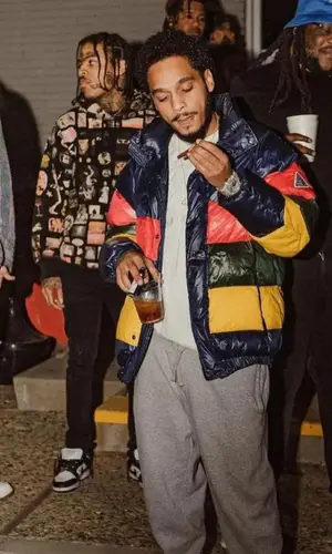 Chris Brown wearing Cosey X Cosey jeans