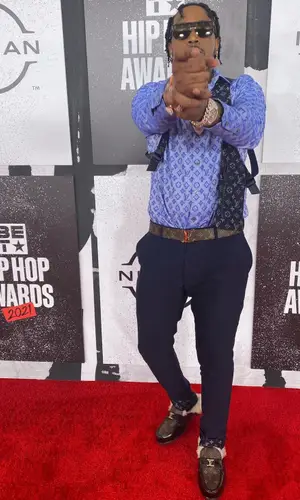 Fivio Foreign wearing Louis Vuitton trousers