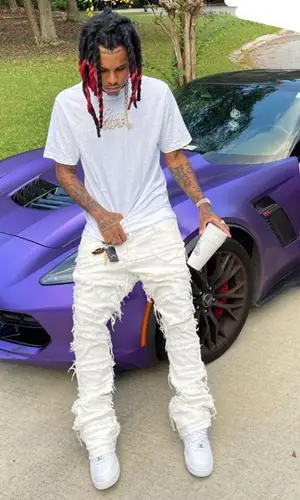 Lil Gnar wearing Valabasas jeans