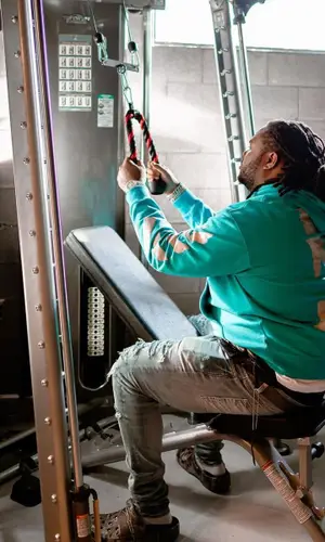 Tee Grizzley wearing Crocs sandal