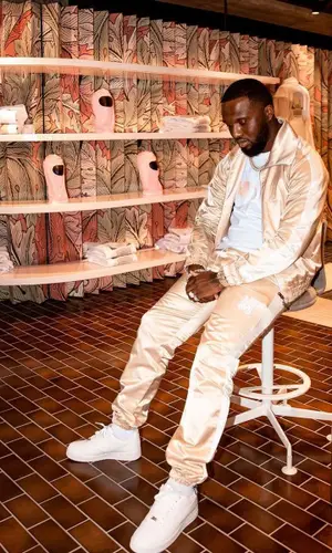 Headie One wearing Amiri jacket