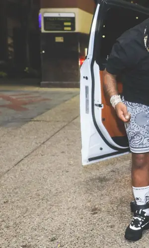 42 Dugg wearing Supreme hat