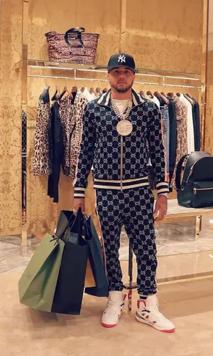 Mazi Vs wearing Gucci pants