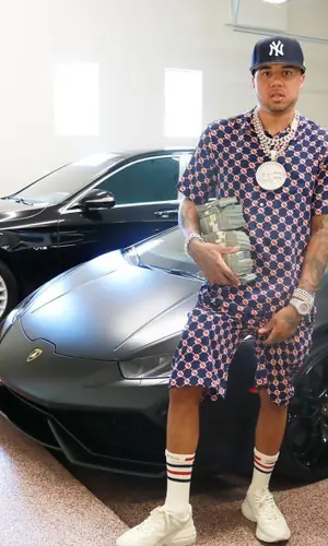 Mazi Vs wearing Gucci shorts