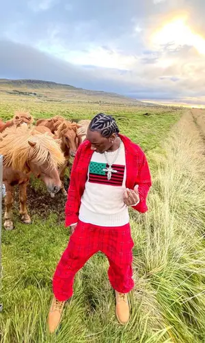 Bloody Osiris wearing Coach shirt