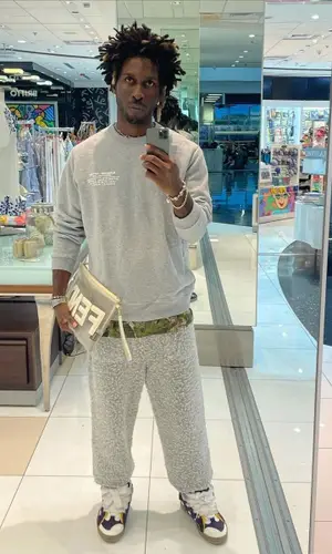 Saint JHN wearing Lanvin sneakers