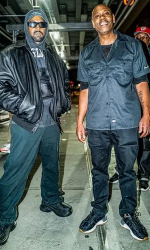 Kanye West wearing Balenciaga bag