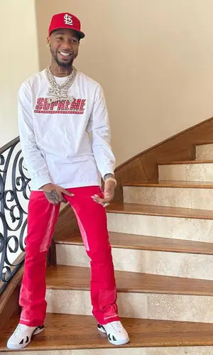 Key Glock wearing New Era cap