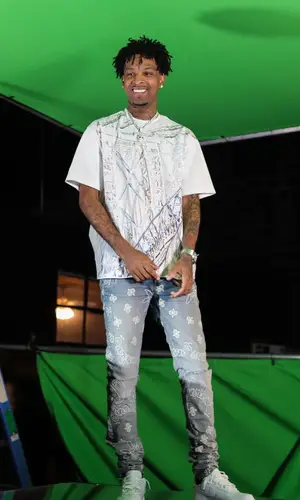 21 Savage wearing Supreme t-shirt