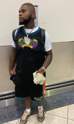 Fat Boy wearing Bread Over Bed shorts