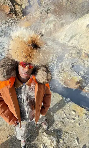 Bloody Osiris wearing Randy's Garments cap