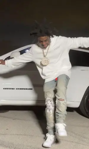 Kodak Black wearing Amiri sweatshirt