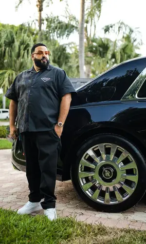DJ Khaled wearing Prada trousers