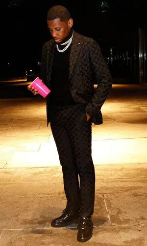 Fabolous wearing Louis Vuitton boots