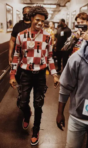 A Boogie Wit Da Hoodie wearing Dior belt