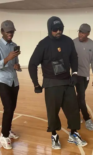 Kanye West wearing Balenciaga bag