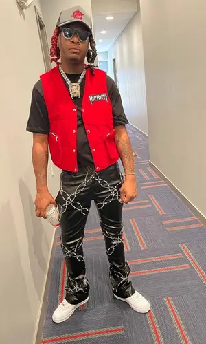 Lil Keed wearing Infiniti jacket