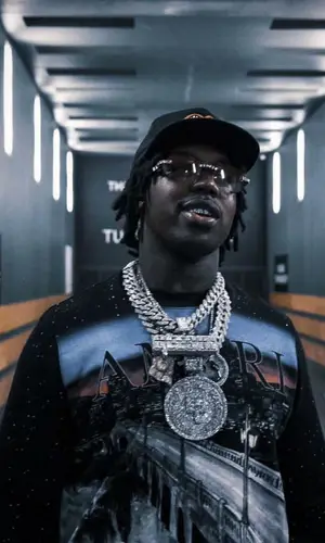 EST Gee wearing Amiri sweater