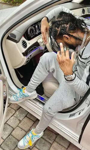 Ron Suno wearing Chrome Hearts cap