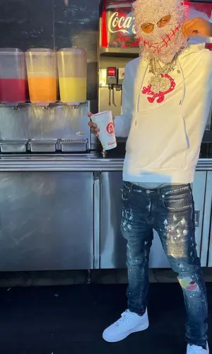 Rich The Kid wearing Sandro hoody