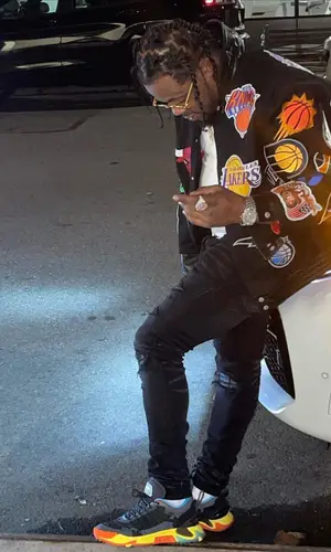 Rowdy Rebel wearing Gucci eyewear