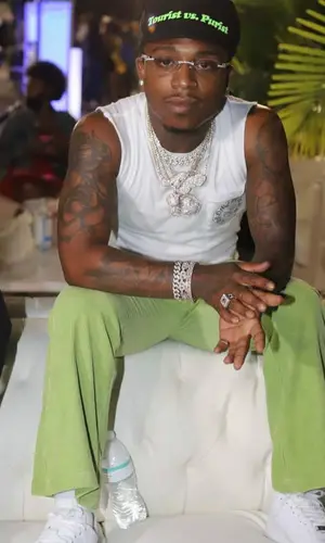 Jacquees wearing Chrome Hearts top