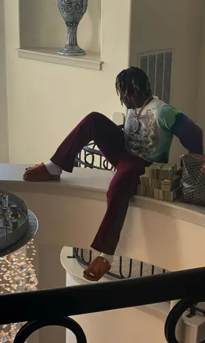 Don Toliver wearing Needles pants