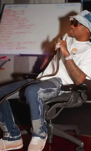 Roddy Ricch wearing Rhude t-shirt