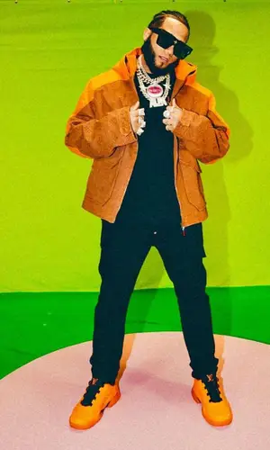 El Alfa El Jefe wearing Amiri sweatshirt