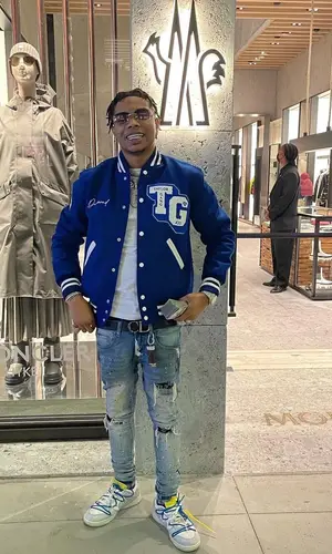 Lil Migo wearing Diamond Supply Co. jacket