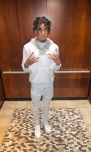 NLE Choppa wearing Calvin Klein hoody