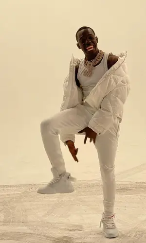 Bobby Shmurda wearing Prada pants