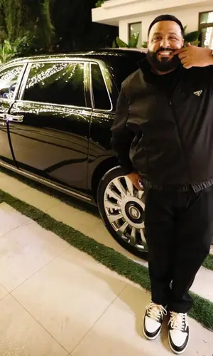 DJ Khaled wearing Prada trousers