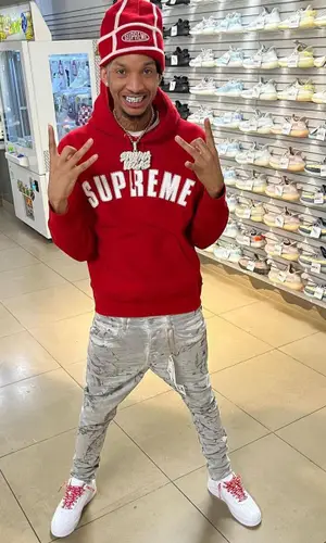 Stunna 4 Vegas wearing Supreme hat