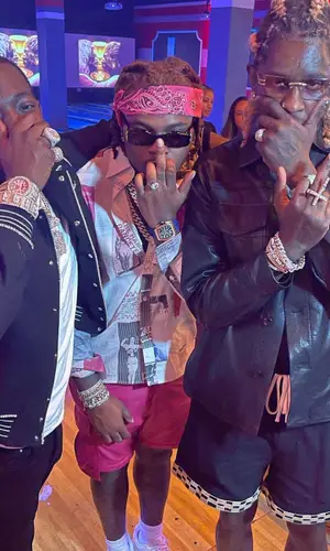 Young Thug wearing Bode shorts