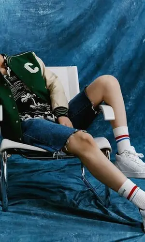 Hueningkai wearing Celine shirt