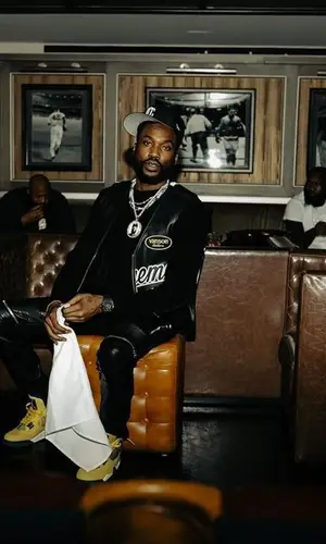Meek Mill wearing Supreme jacket