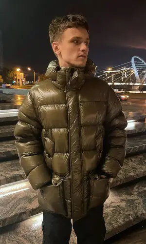 John However wearing Stone Island pants