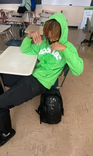 Slump6s wearing Young Thug Merch hoody