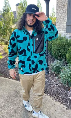 Russ wearing Hugo Boss cap