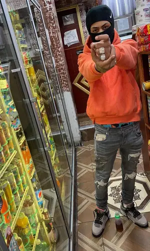 Kay Flock wearing Amiri jeans