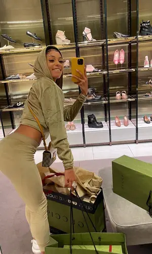 Coi Leray wearing Skims pants