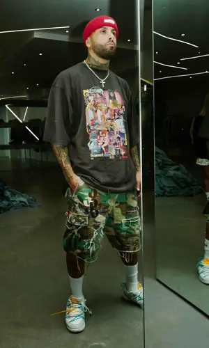 Nicky Jam wearing GCDS hat