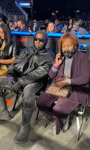 Kanye West wearing Balenciaga bag