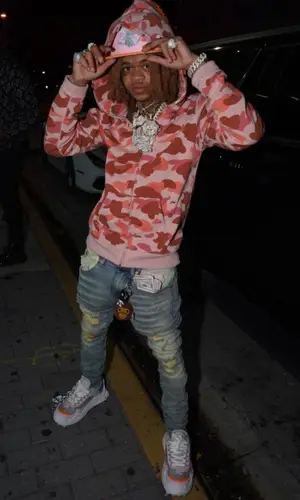 SpotemGottem wearing Off-White sneakers