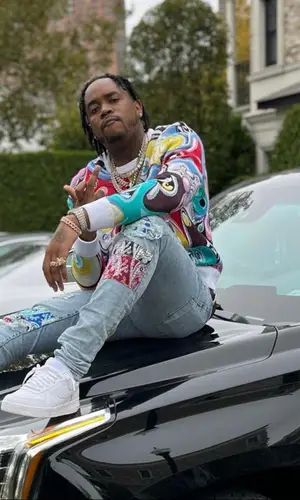 Fivio Foreign wearing Dior sweater