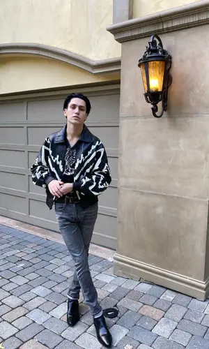 Lil Huddy wearing Celine jacket