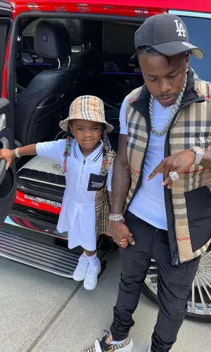DaBaby wearing Burberry jacket