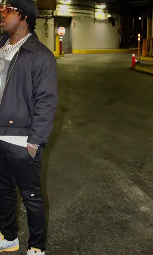 EST Gee wearing Dickies pants